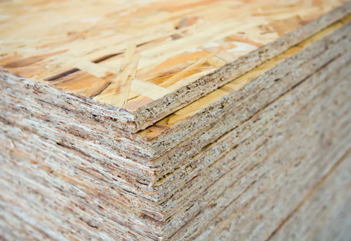 A stack of OSB sheets stacked one on another